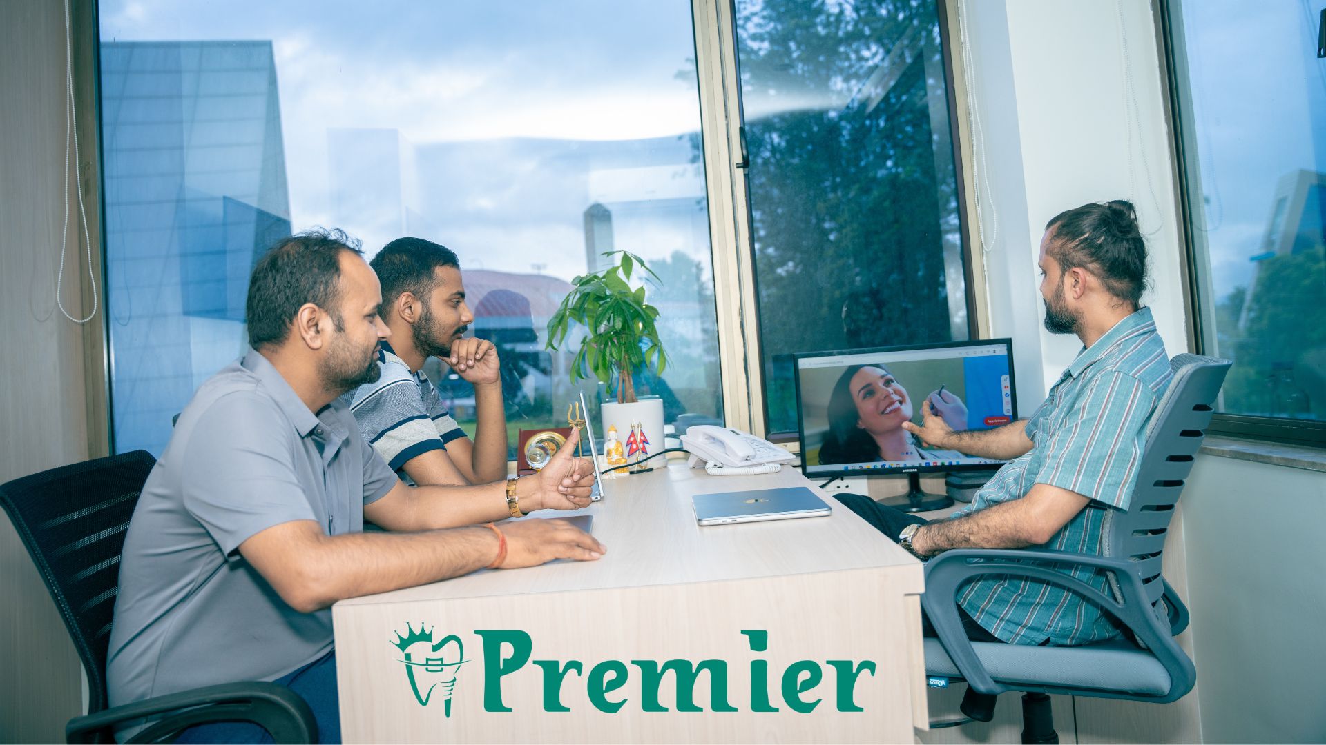 Price of dental implants in Kathmandu, Nepal - Premier Dental staff explaining payment plans for dental implants